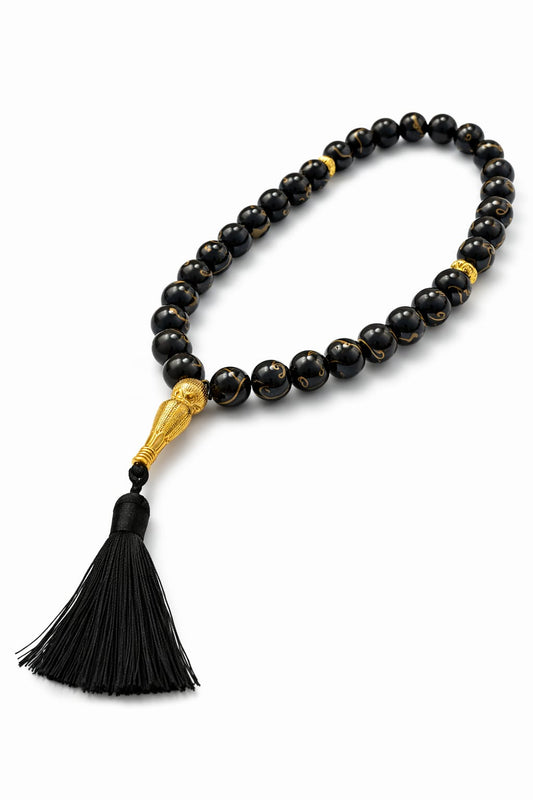 Mătănii de sticlă neagră cu inserții aurii